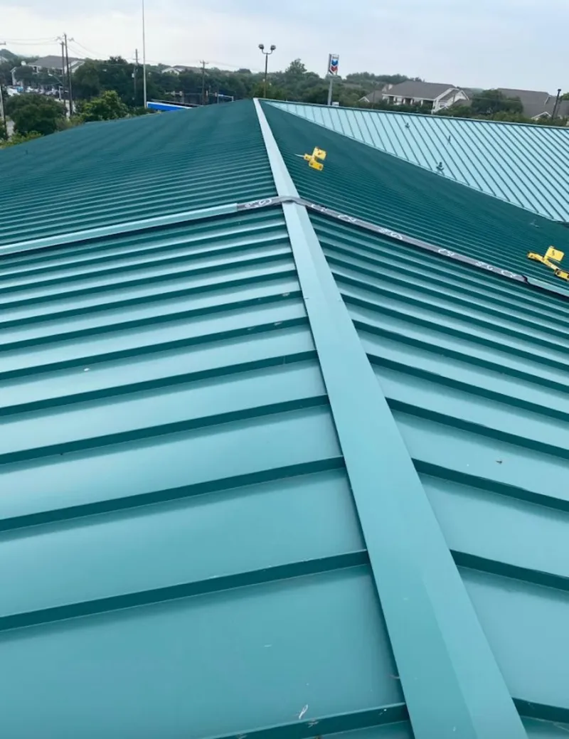 Green commercial metal roof ridge and valley for Metal Roof Repair in Parkwood