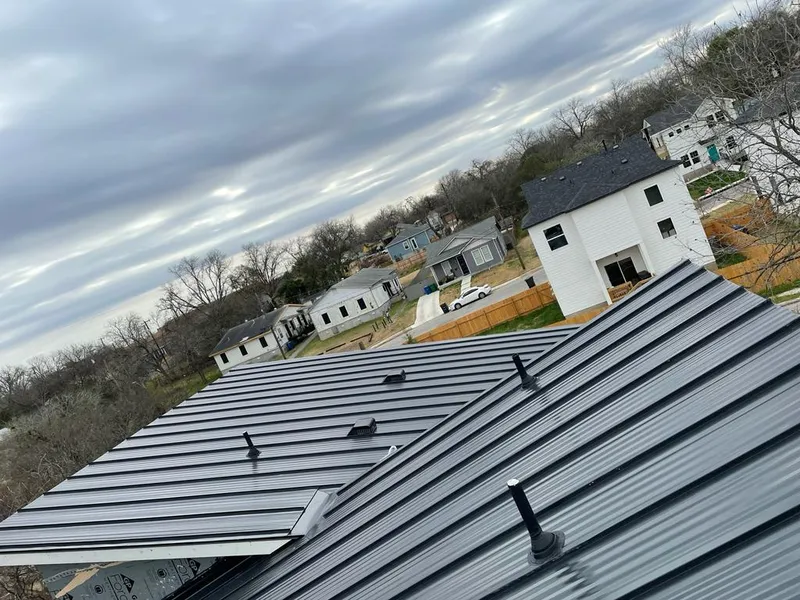 Standing seam metal roof panels with vents for Skylight Repair in Parkwood